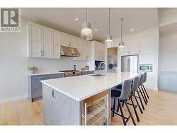 Large Island with wine fridge and extra storage -