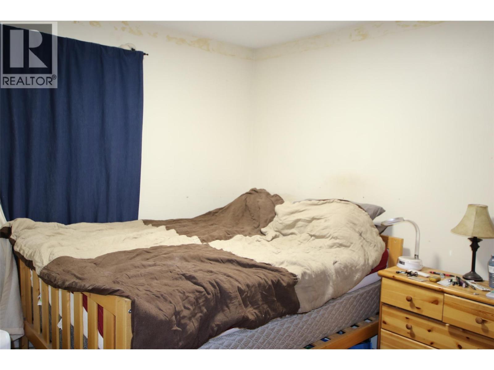 195 Chamberlain Crescent Unit# 206, Tumbler Ridge, BC - Indoor Photo Showing Bedroom