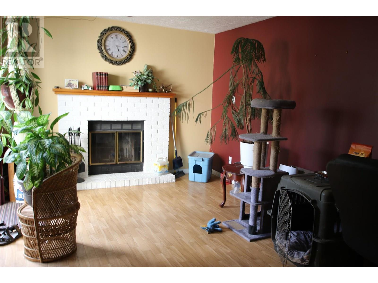 232 Bergeron Drive, Tumbler Ridge, BC - Indoor Photo Showing Living Room With Fireplace