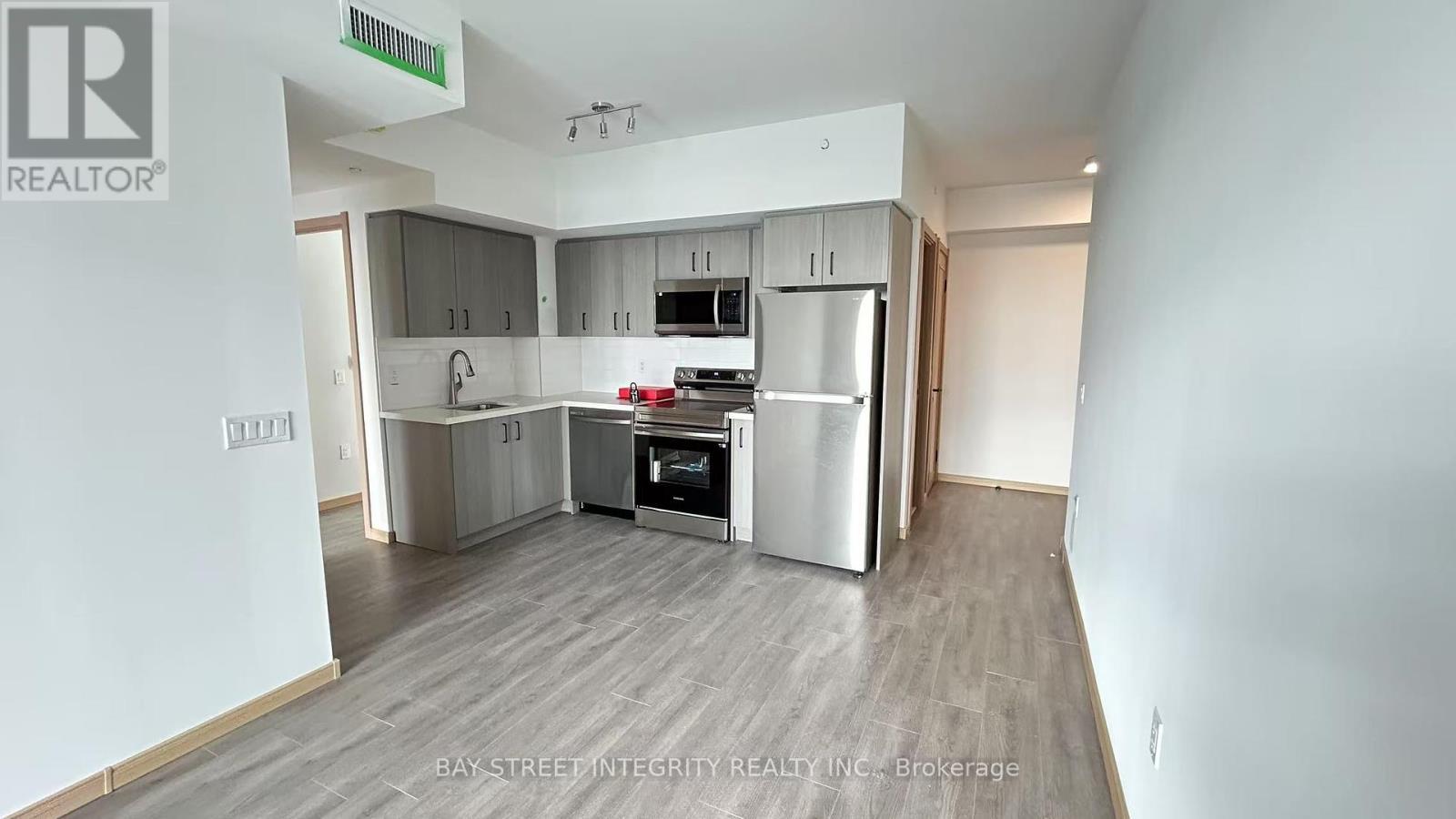 B617 - 3429 Sheppard Avenue E, Toronto, ON - Indoor Photo Showing Kitchen With Stainless Steel Kitchen