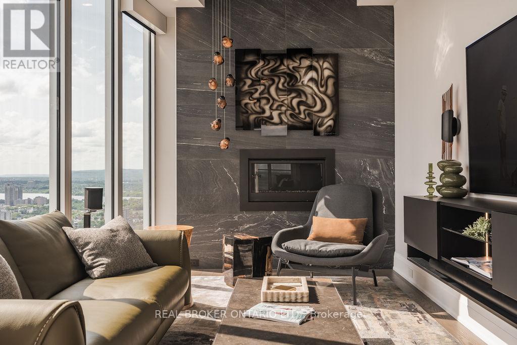 4401 - 805 Carling Avenue, Ottawa, ON - Indoor Photo Showing Other Room With Fireplace