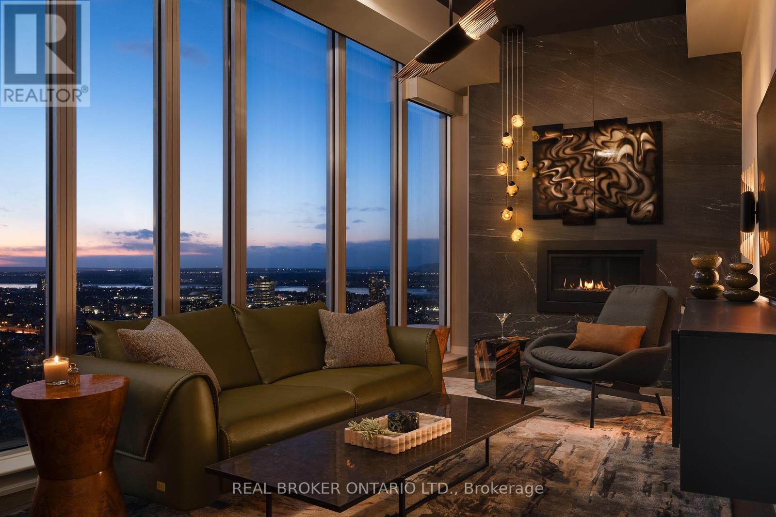 4401 - 805 Carling Avenue, Ottawa, ON - Indoor Photo Showing Living Room With Fireplace