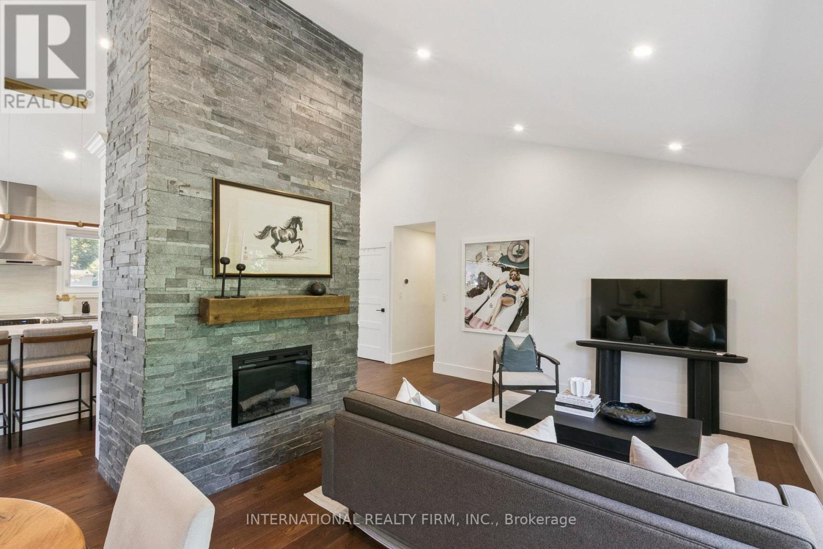 27 Treadgold Crescent, Toronto, ON - Indoor Photo Showing Living Room With Fireplace
