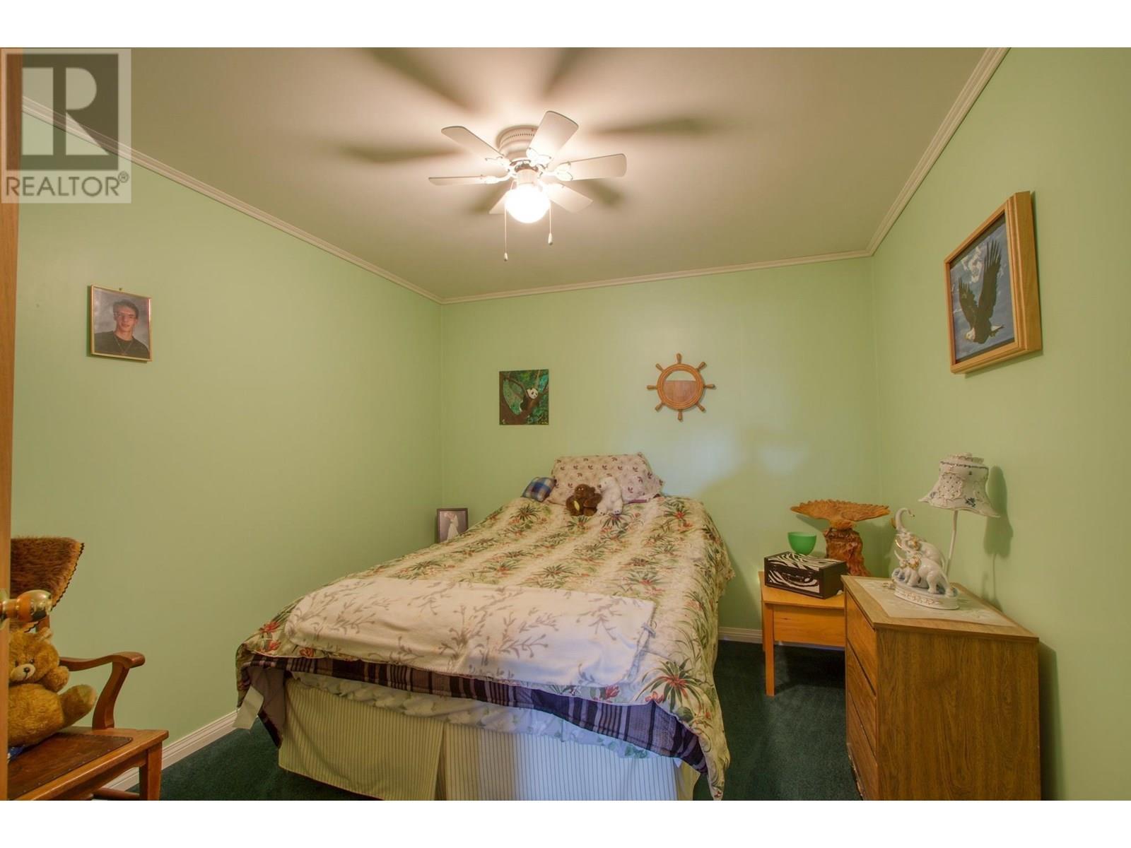 3988 S Cariboo 97 Highway, Lac La Hache, BC - Indoor Photo Showing Bedroom