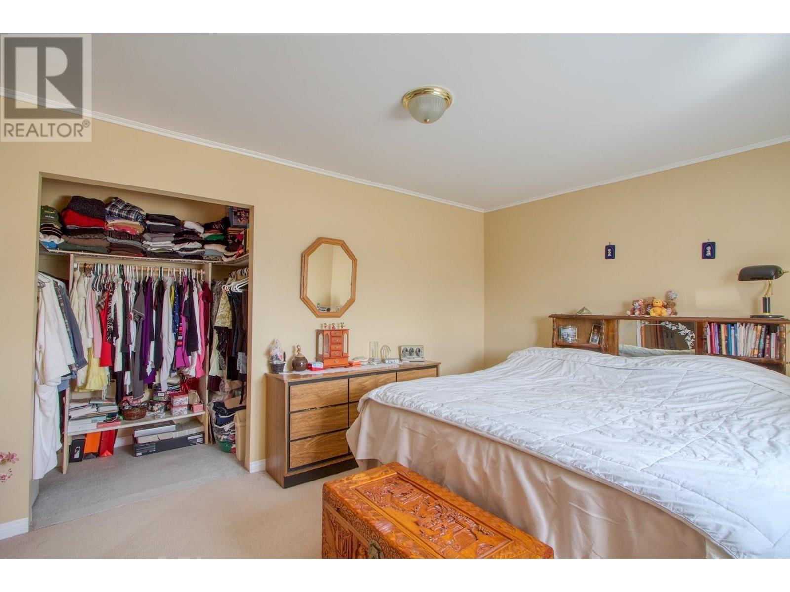 3988 S Cariboo 97 Highway, Lac La Hache, BC - Indoor Photo Showing Bedroom