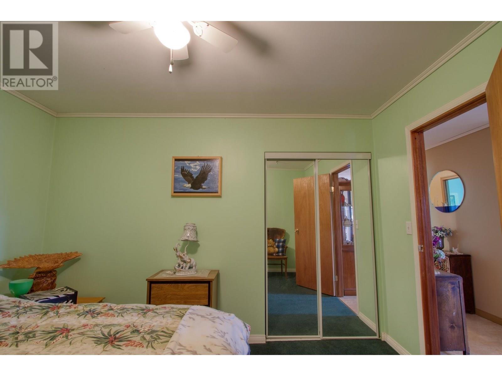 3988 S Cariboo 97 Highway, Lac La Hache, BC - Indoor Photo Showing Bedroom