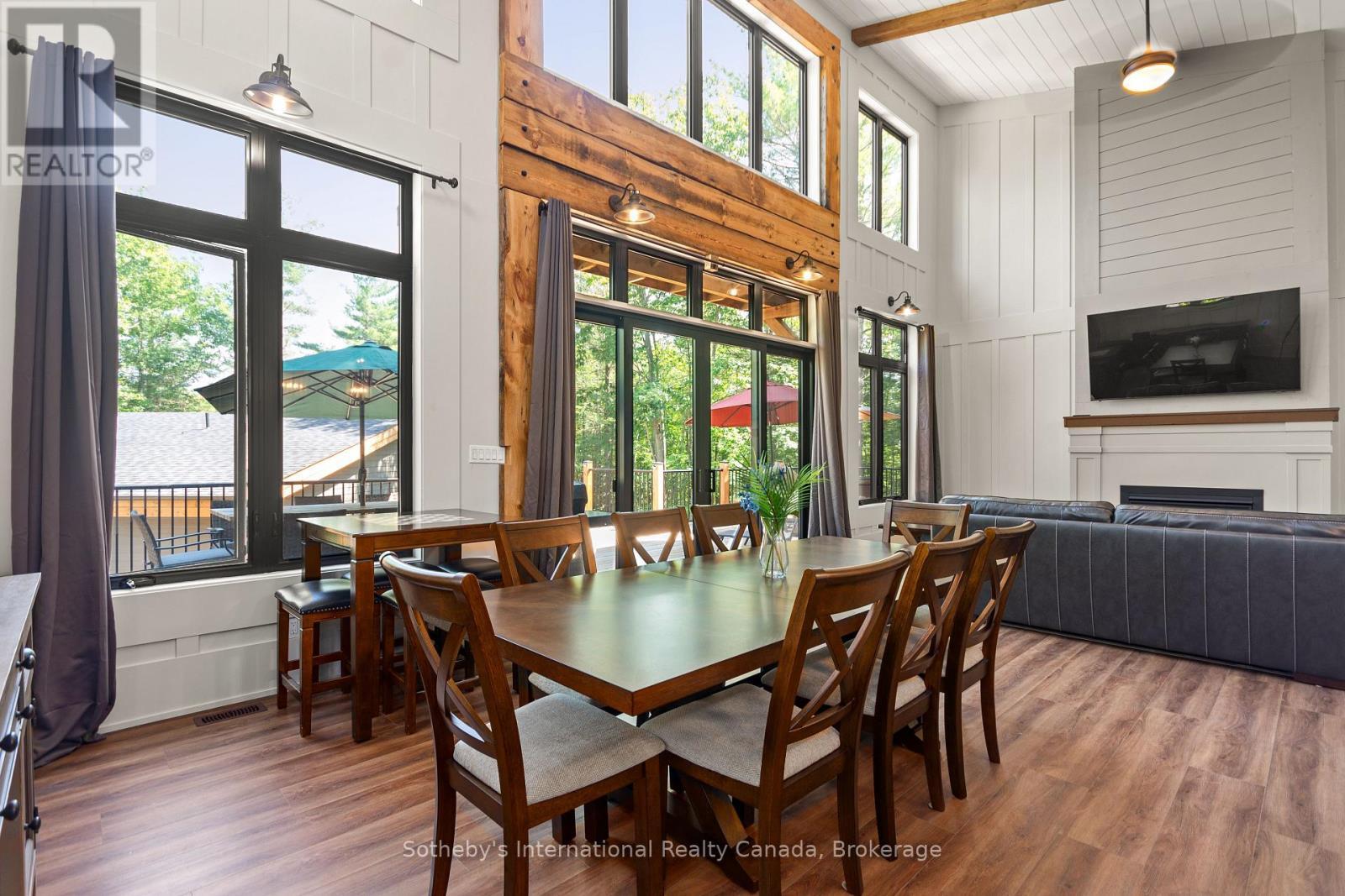 103 Whites Falls Road, Georgian Bay (Baxter), ON - Indoor Photo Showing Dining Room With Fireplace