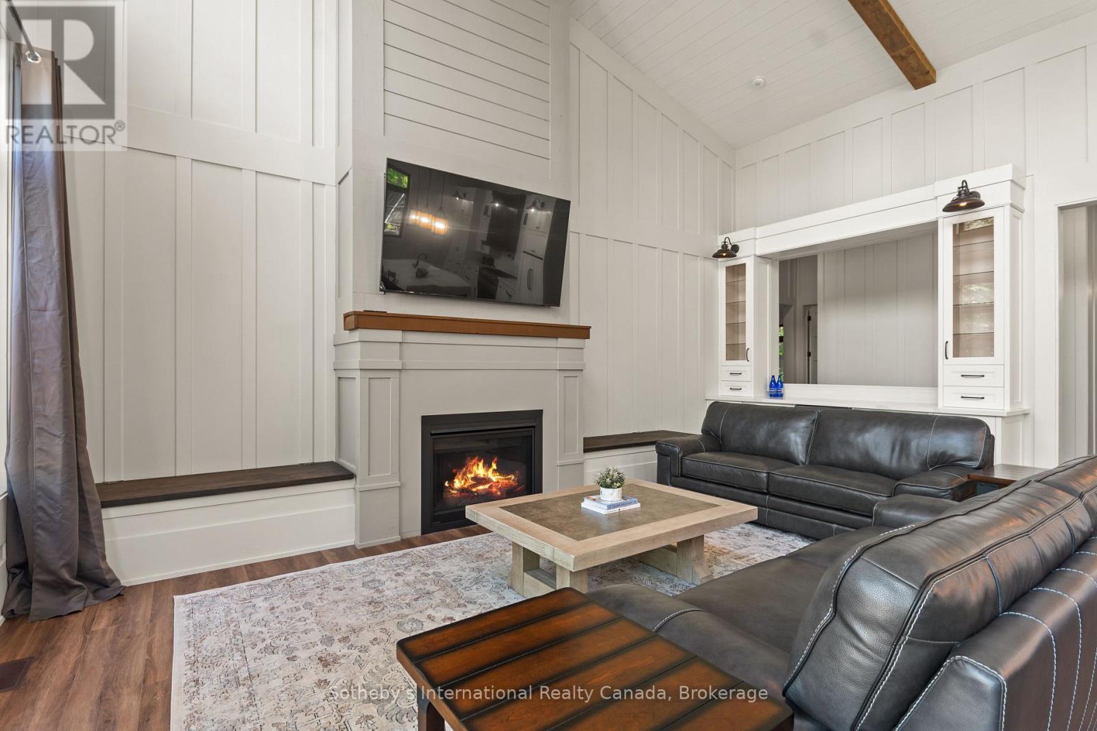 103 Whites Falls Road, Georgian Bay (Baxter), ON - Indoor Photo Showing Living Room With Fireplace