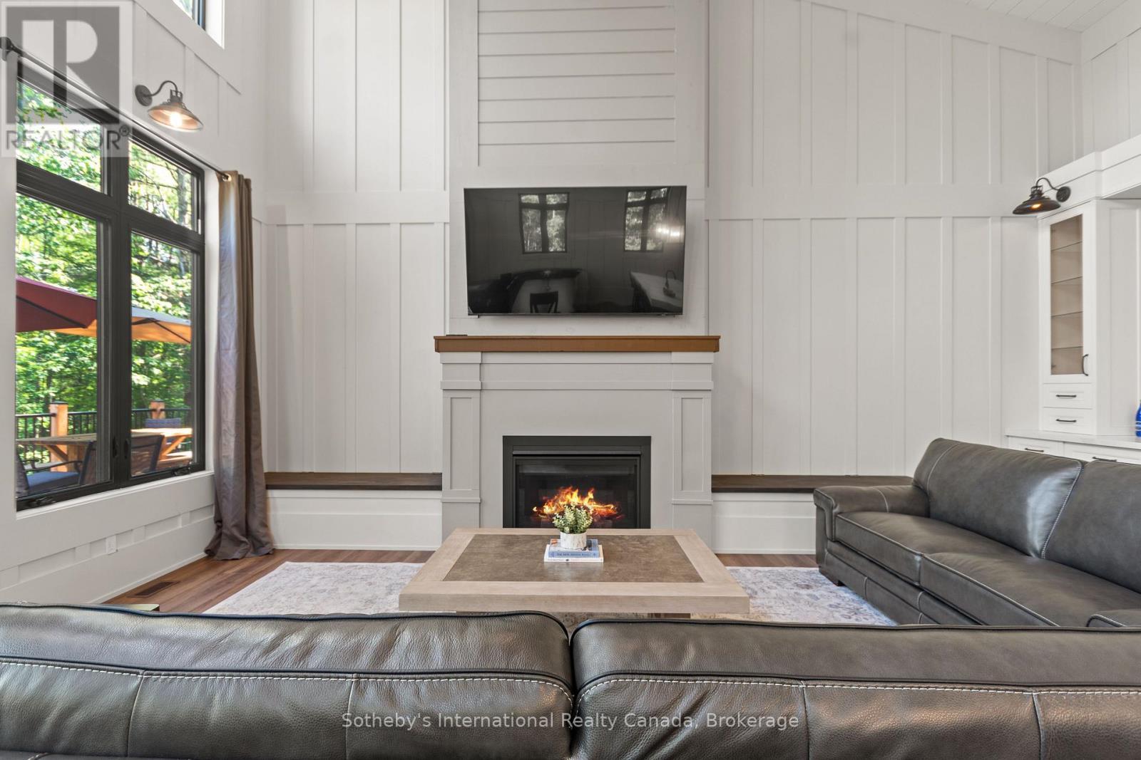 103 Whites Falls Road, Georgian Bay (Baxter), ON - Indoor Photo Showing Living Room With Fireplace