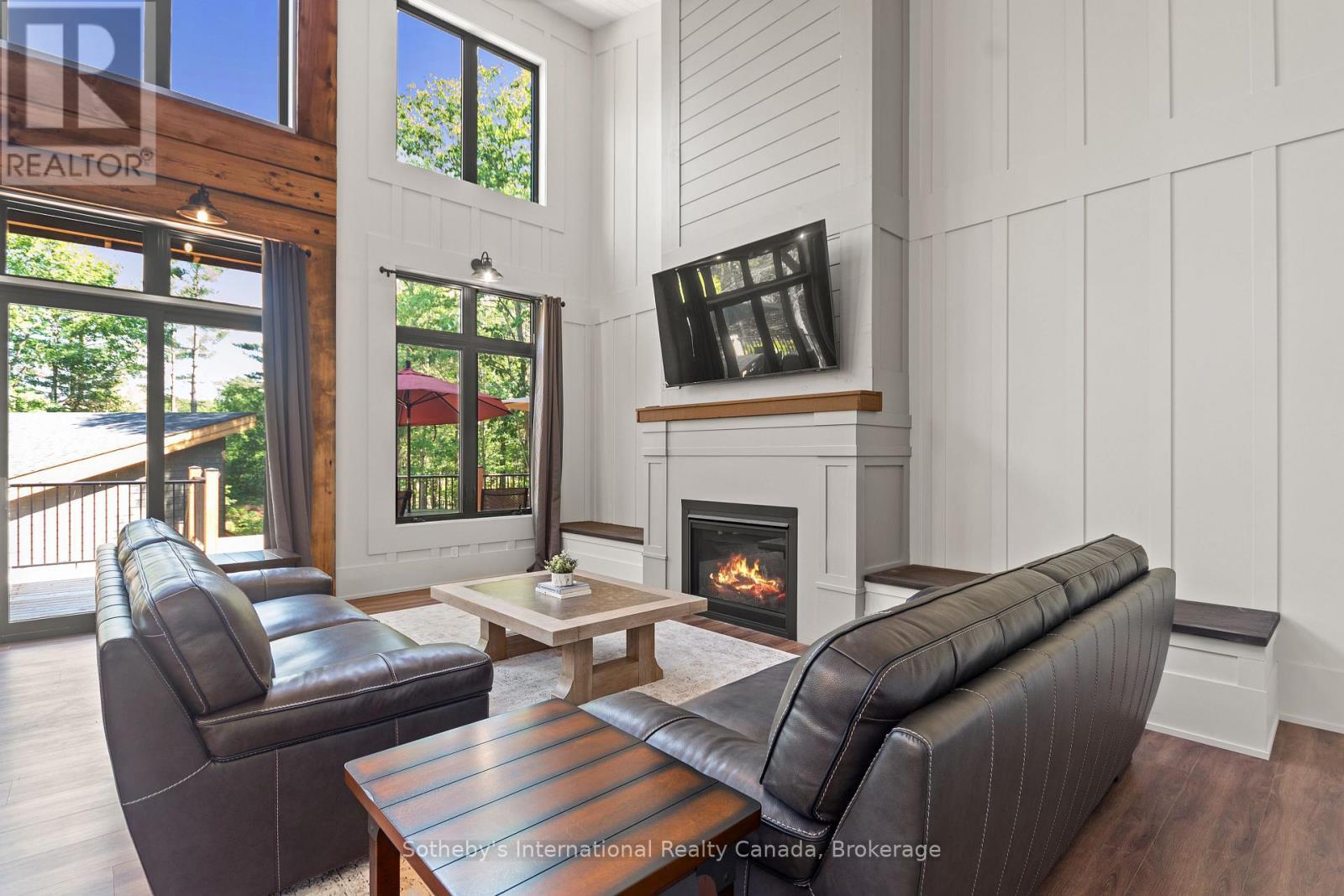 103 Whites Falls Road, Georgian Bay (Baxter), ON - Indoor Photo Showing Living Room With Fireplace