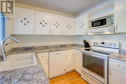 Kitchen with deck walkout -