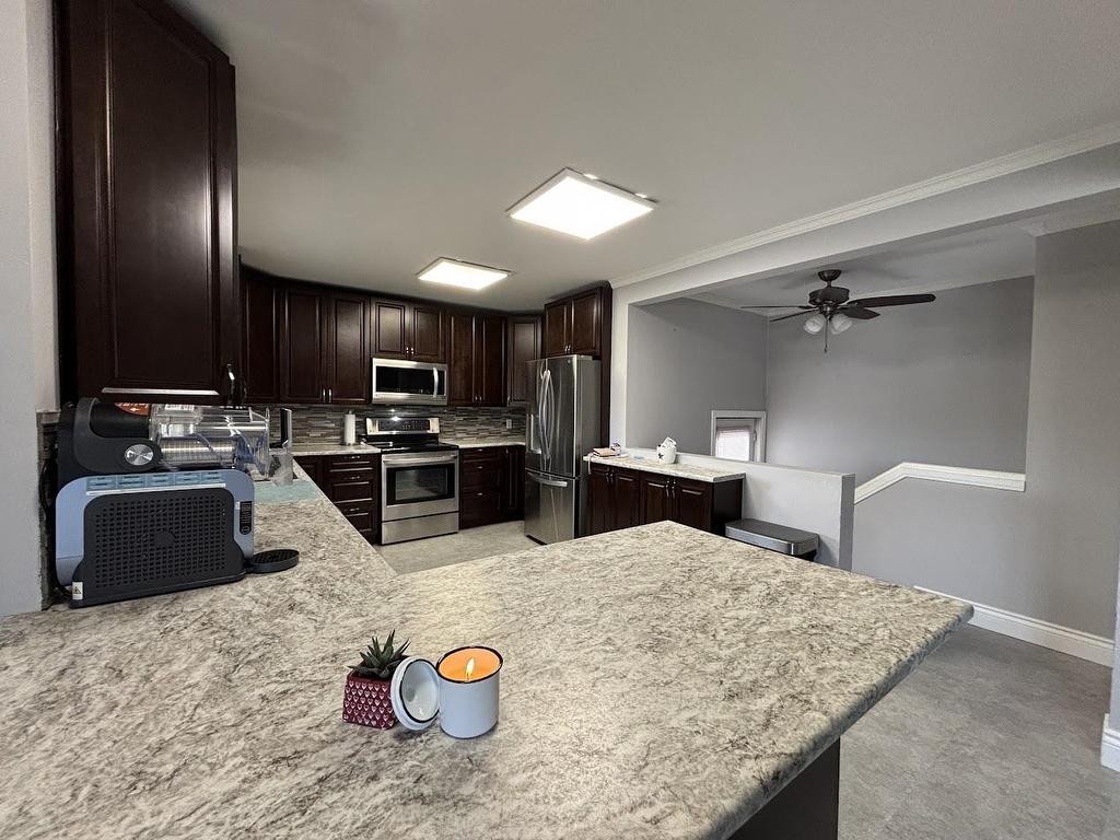 2 Essa Place, Manitouwadge, ON - Indoor Photo Showing Kitchen With Stainless Steel Kitchen With Double Sink