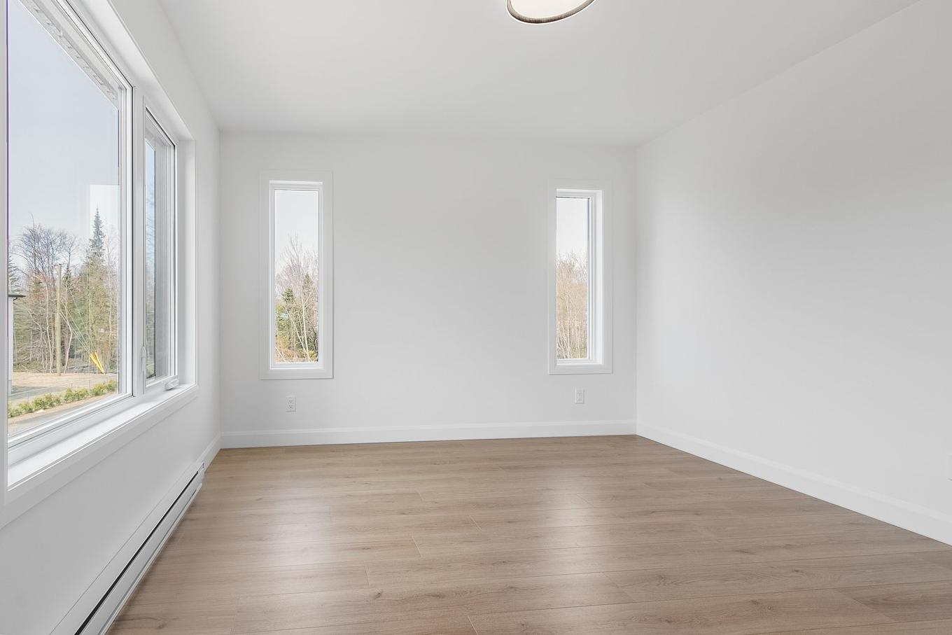 Chambre à coucher principale - Rue Des Premières-Nations, Québec (Beauport), QC - Indoor Photo Showing Other Room