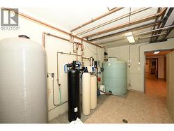 Utility room for well, water treatment & sprinkler system reservoir -