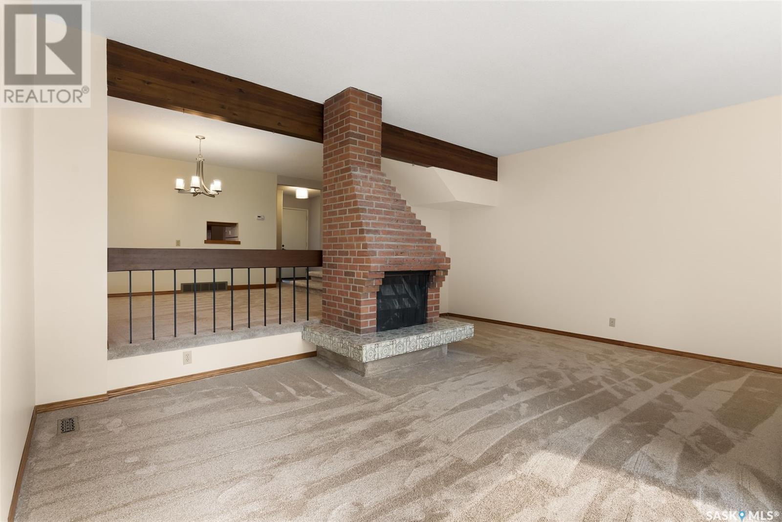 1615 23Rd Avenue, Regina, SK - Indoor Photo Showing Other Room With Fireplace