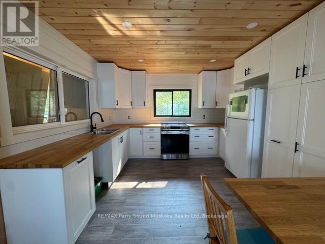 1370 Georgian Bay Water, The Archipelago (Archipelago North), ON - Indoor Photo Showing Kitchen With Double Sink