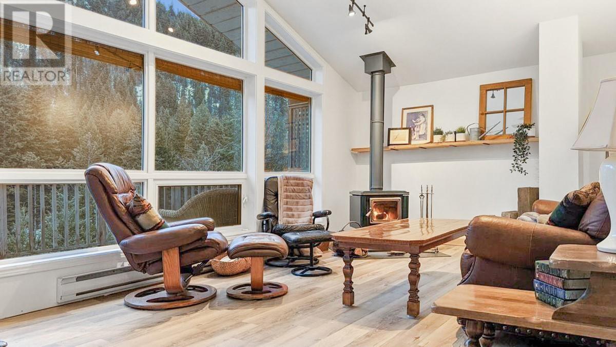 221 Prospect Drive, Princeton, BC - Indoor Photo Showing Other Room With Fireplace