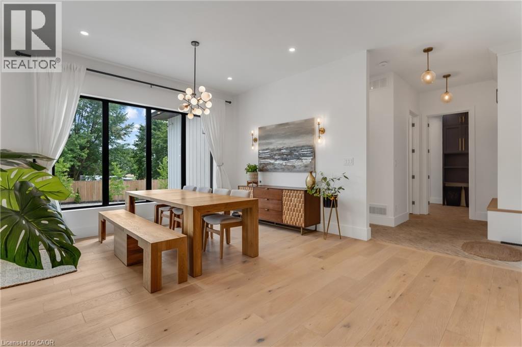 Dining space featuring light wood finished floors, a chandelier, and recessed lighting - 4678 Lobsinger Line, Crosshill, ON - Indoor Photo Showing Other Room