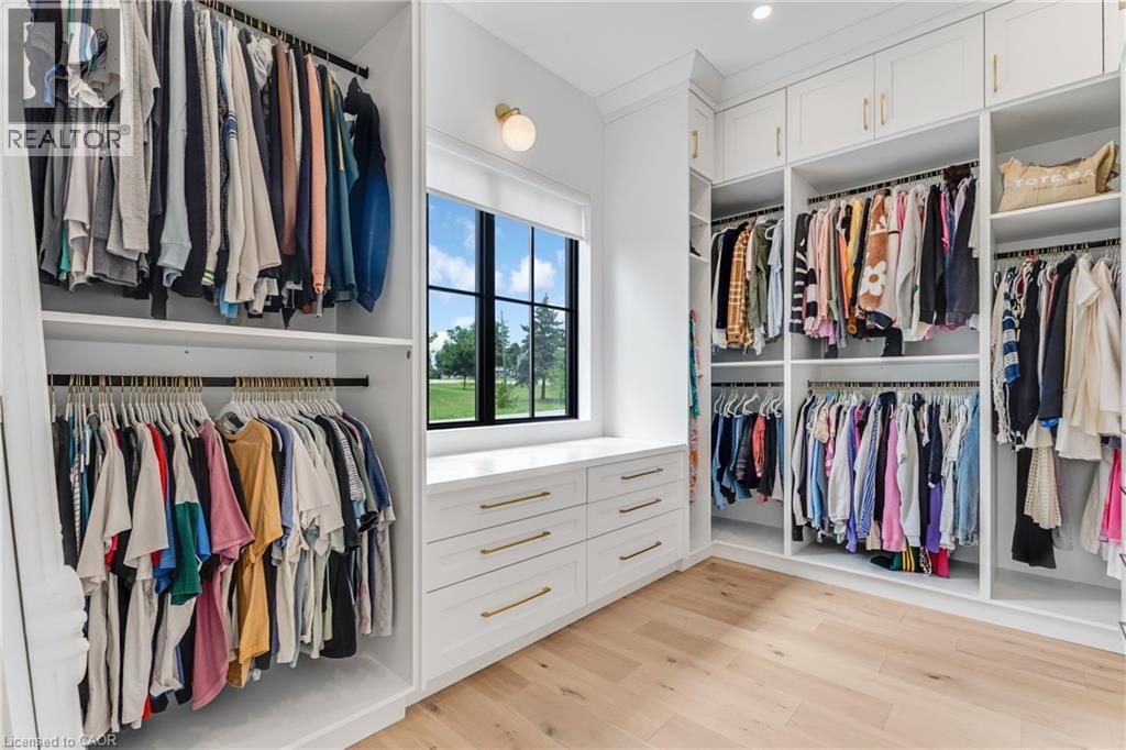 Spacious closet featuring light wood-style floors - 4678 Lobsinger Line, Crosshill, ON - Indoor With Storage