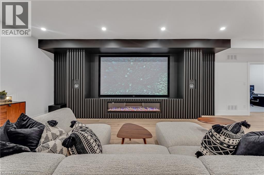 Cinema room featuring wood finished floors and recessed lighting - 4678 Lobsinger Line, Crosshill, ON - Indoor