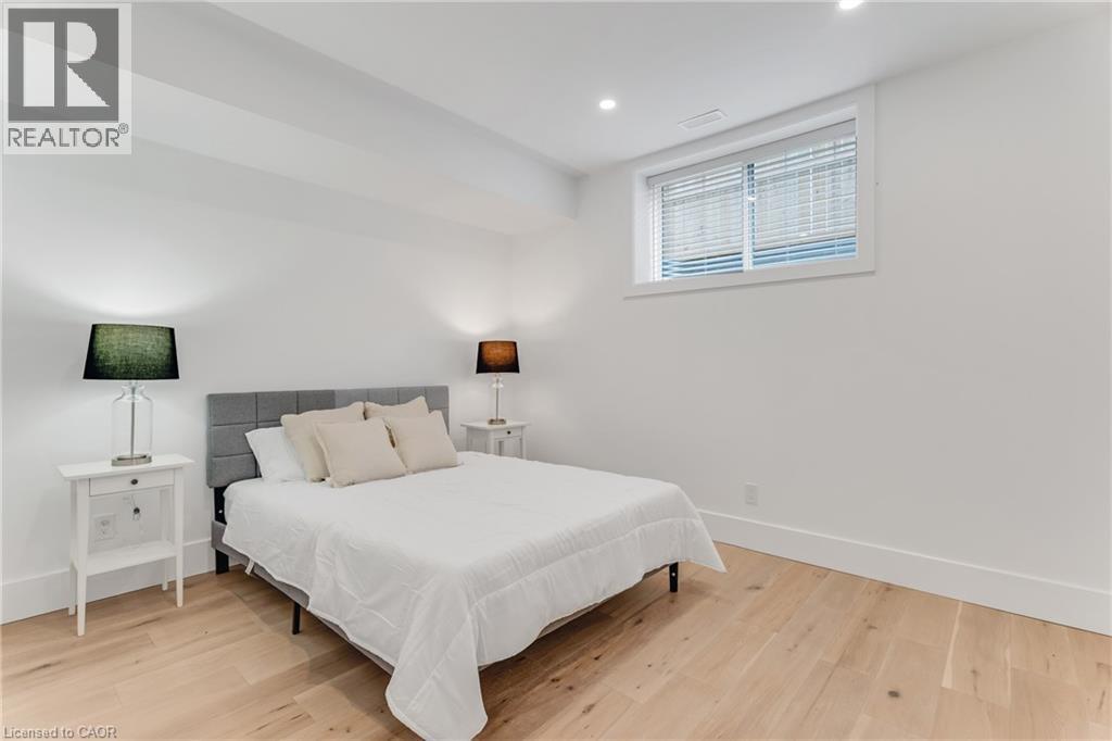 Bedroom featuring wood finished floors and recessed lighting - 4678 Lobsinger Line, Crosshill, ON - Indoor Photo Showing Bedroom