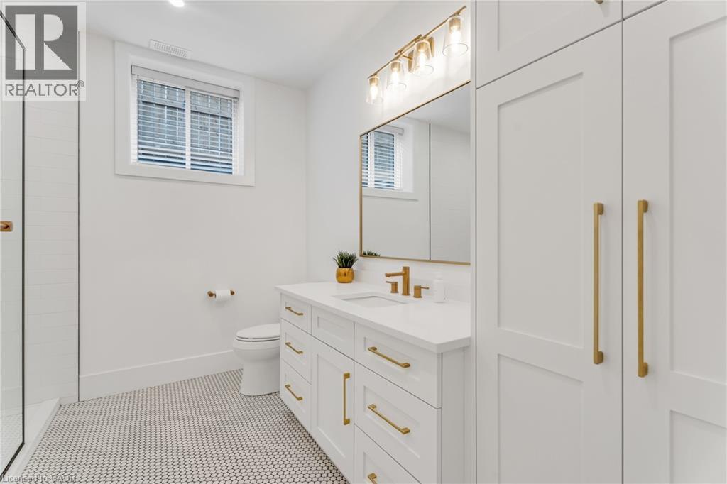 Full bathroom with vanity, a tile shower, and tile patterned floors - 4678 Lobsinger Line, Crosshill, ON - Indoor Photo Showing Bathroom