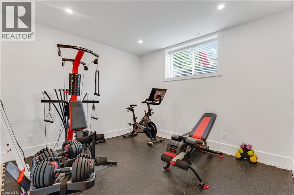 Exercise room with baseboards and recessed lighting - 4678 Lobsinger Line, Crosshill, ON - Indoor Photo Showing Gym Room