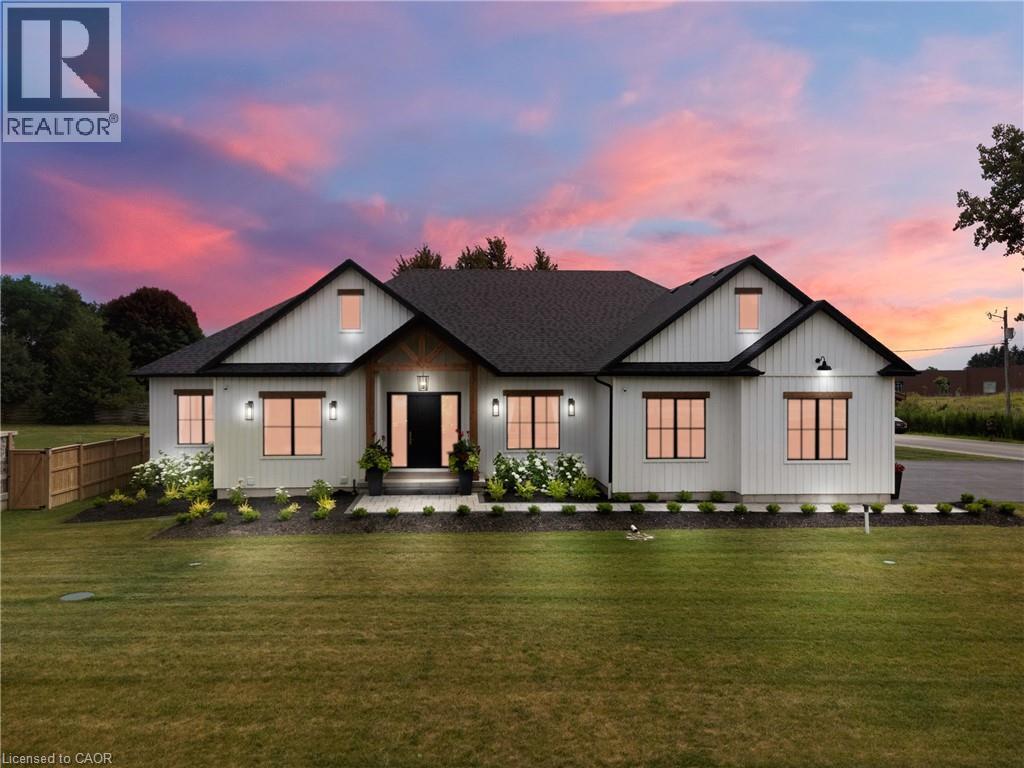 Modern farmhouse style home with a shingled roof - 4678 Lobsinger Line, Crosshill, ON - Outdoor With Facade