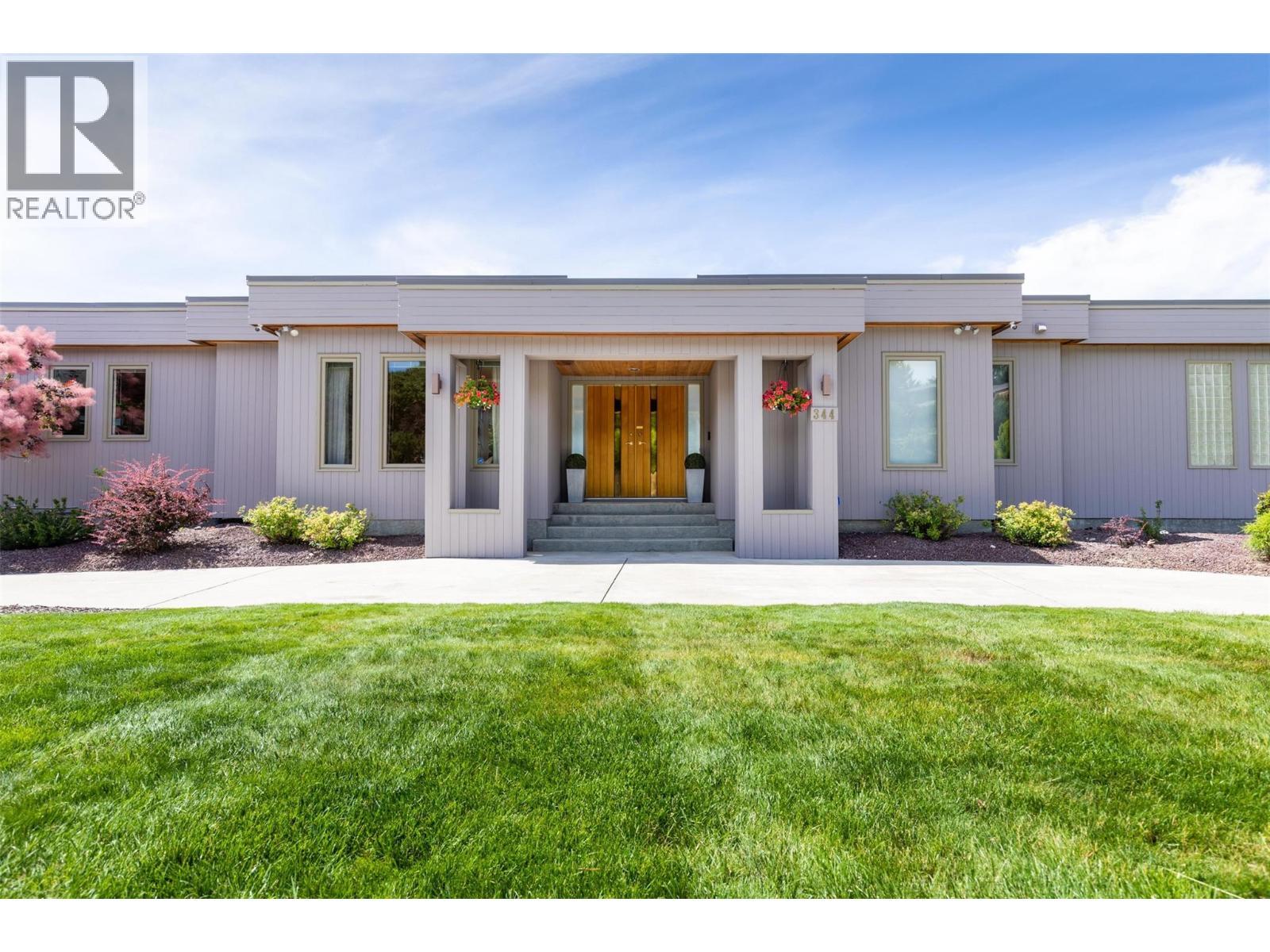 344 Raven Drive, Kelowna, BC - Outdoor With Facade