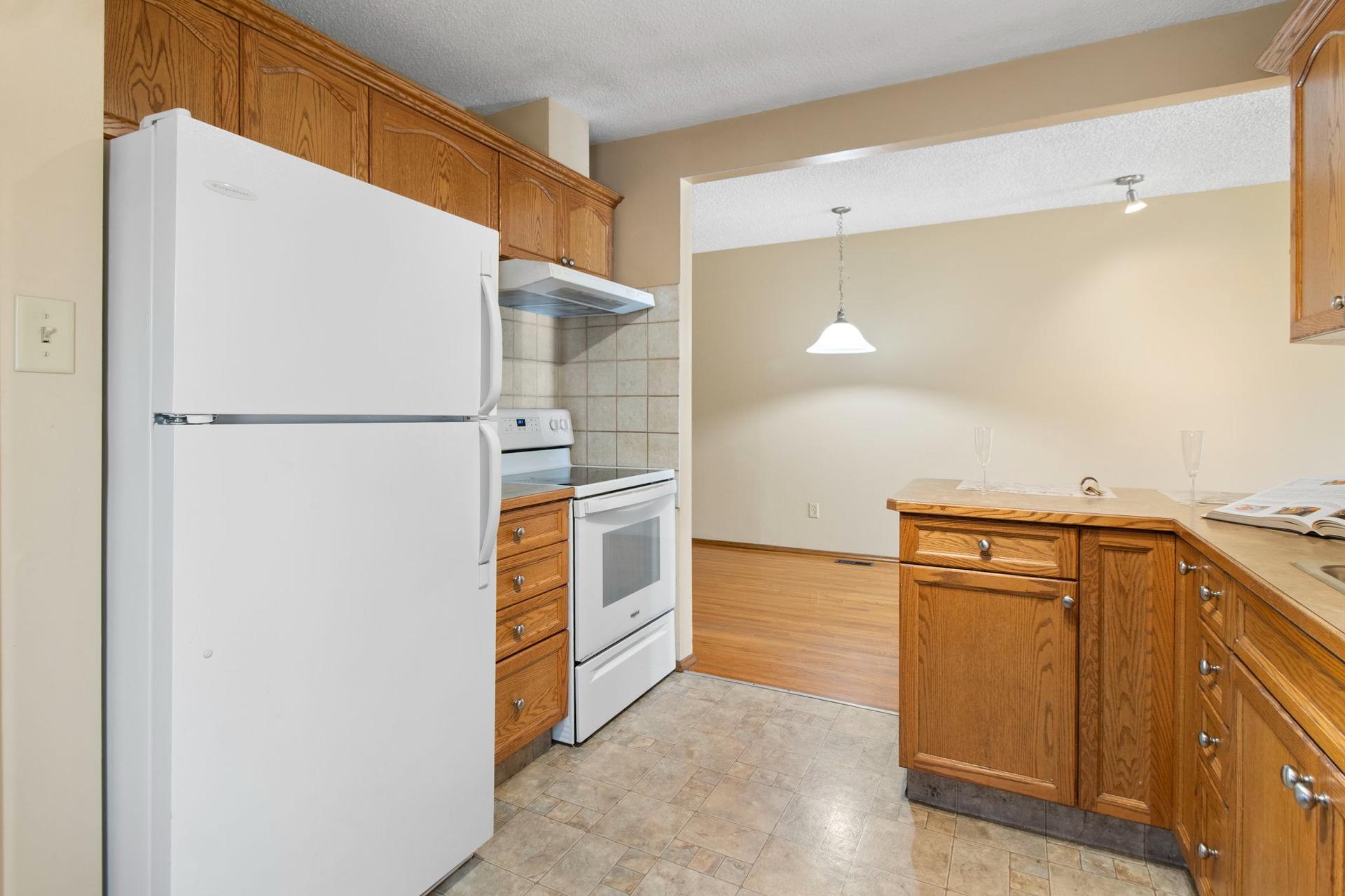 Calgary, AB - Indoor Photo Showing Kitchen