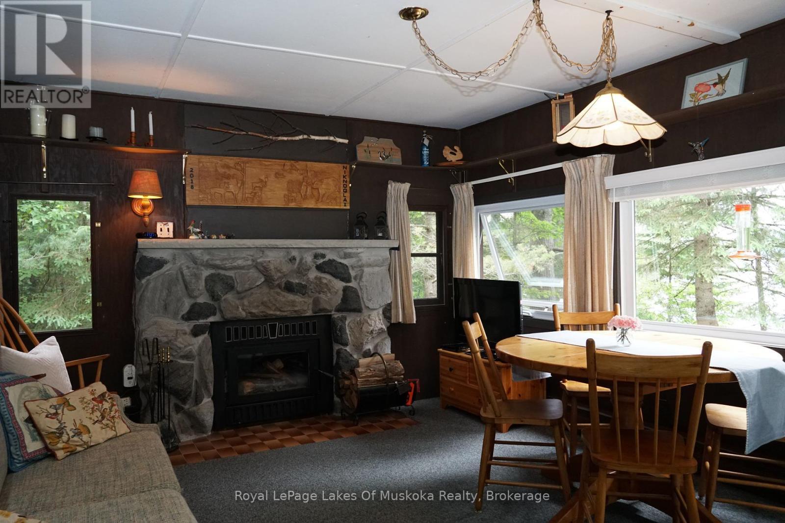 1173 Lake Of Two Rivers, South Algonquin, ON - Indoor With Fireplace