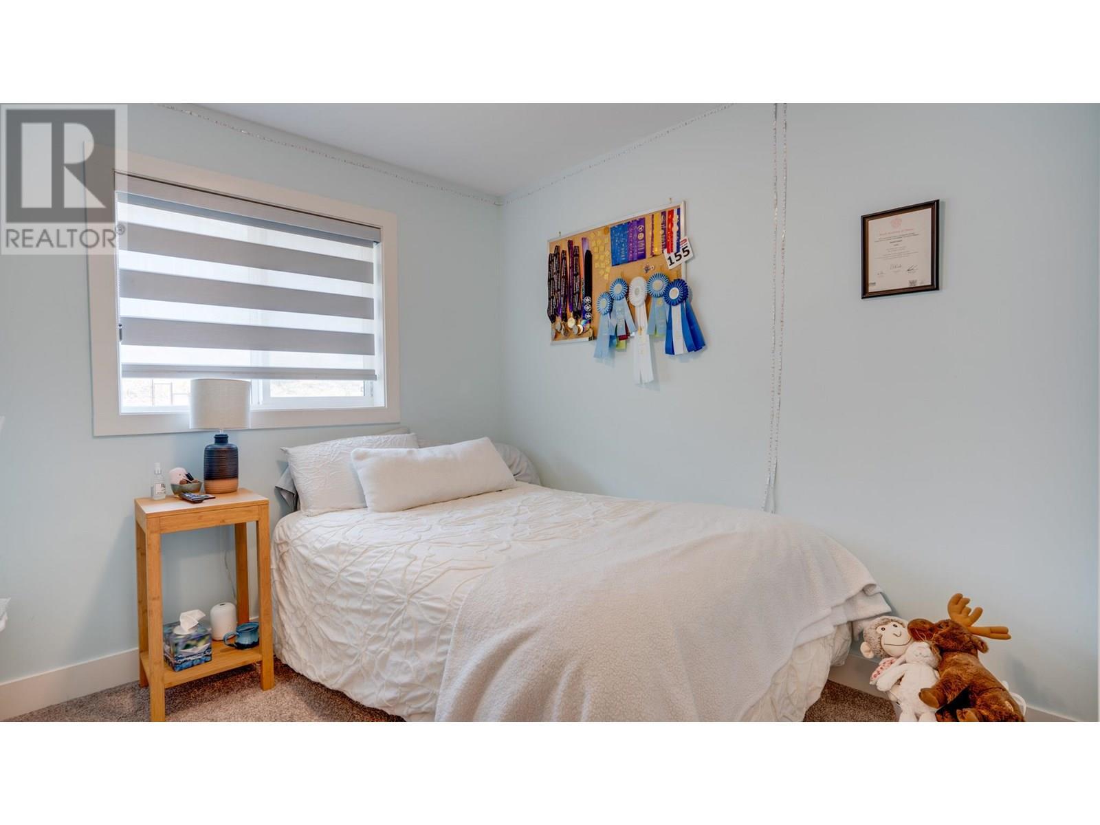 933 Mt Robson Place Unit# 3, Vernon, BC - Indoor Photo Showing Bedroom