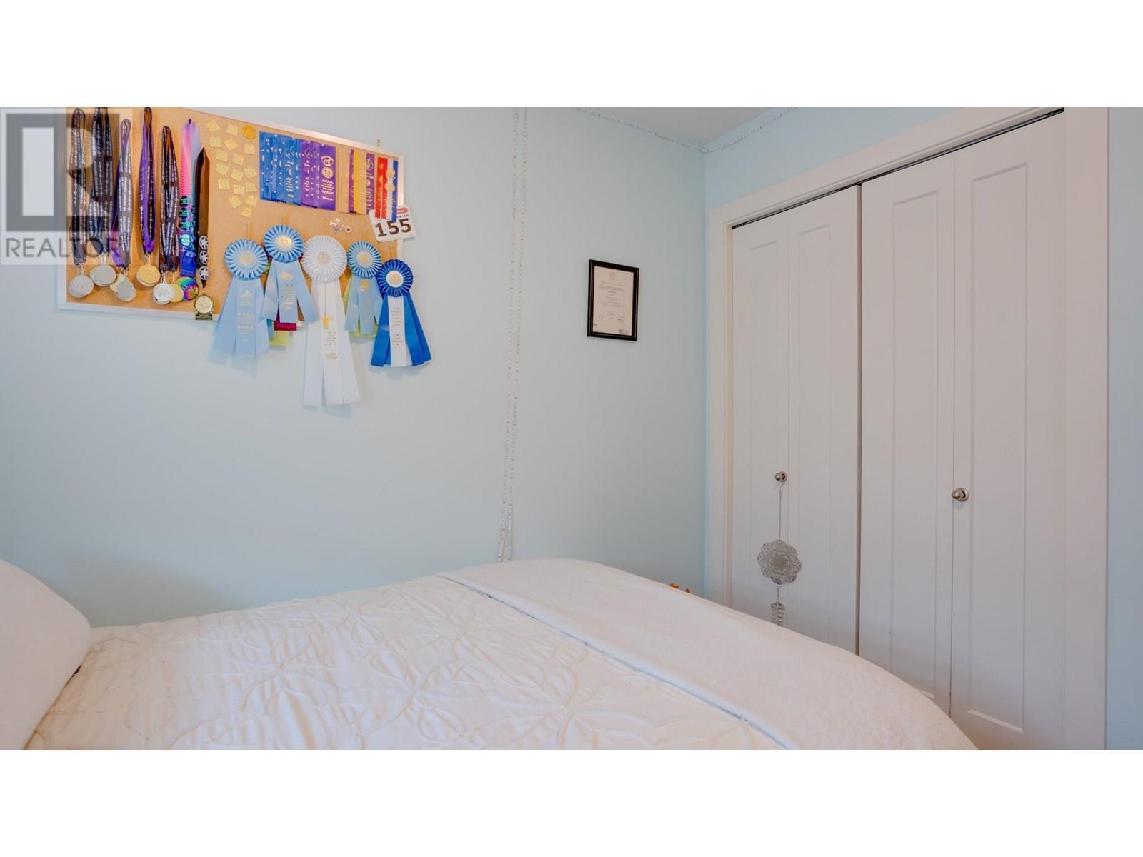 933 Mt Robson Place Unit# 3, Vernon, BC - Indoor Photo Showing Bedroom