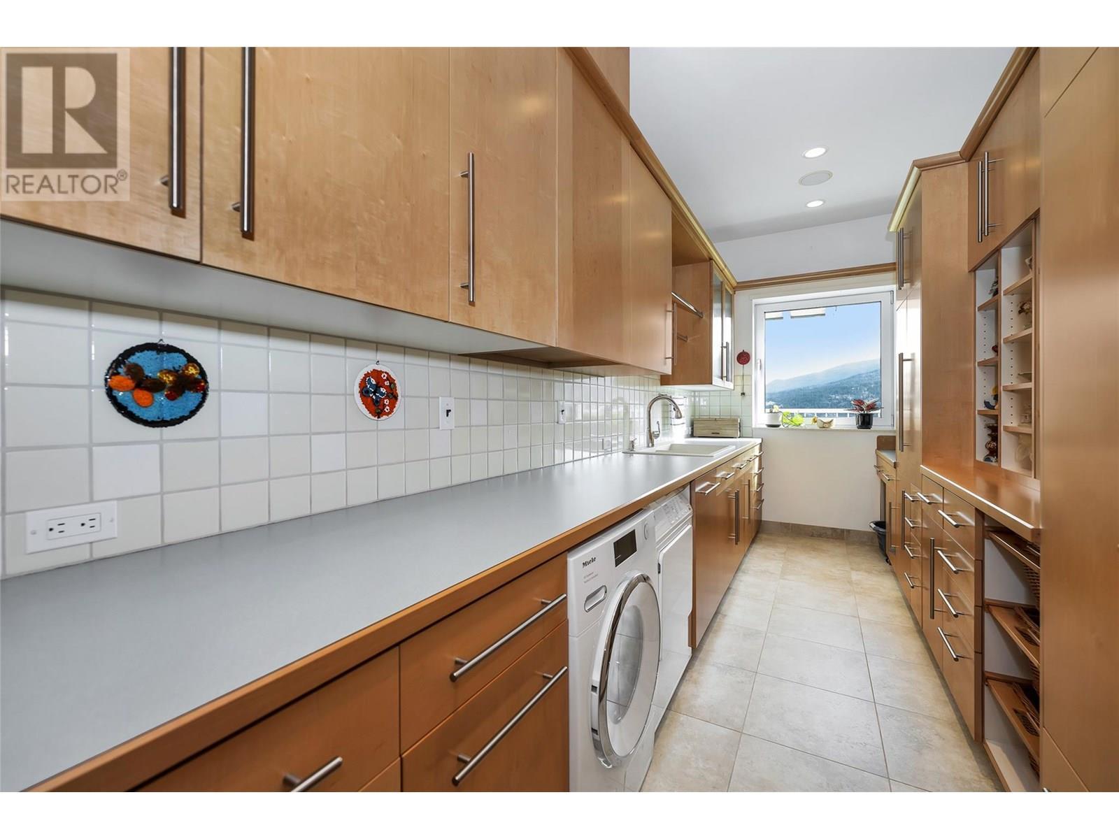 Laundry Room - 202 Stepping Stones Crescent, Spallumcheen, BC