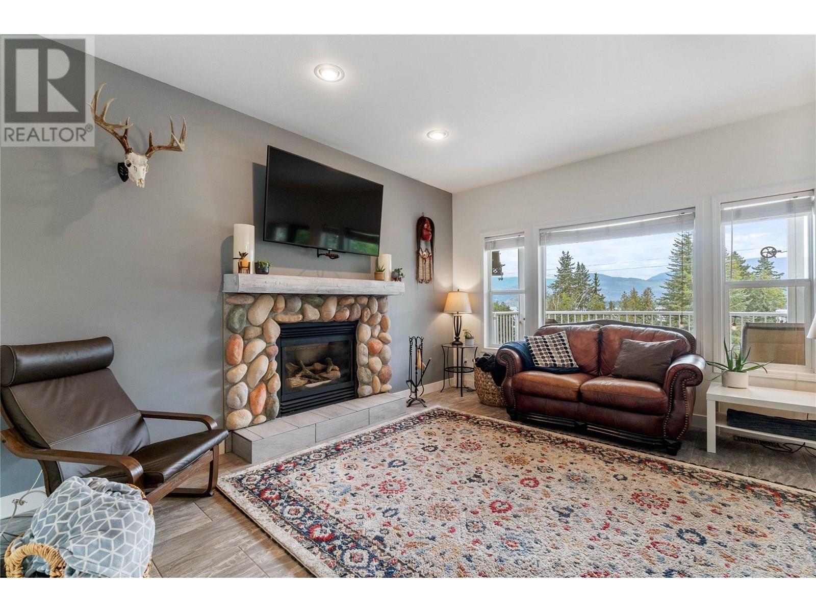 2662 Blind Bay Road, Blind Bay, BC - Indoor Photo Showing Living Room With Fireplace
