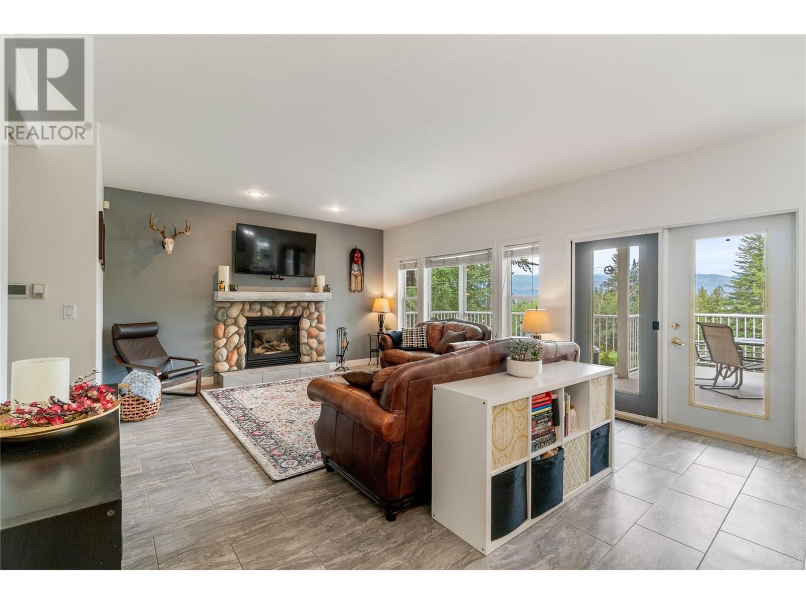 2662 Blind Bay Road, Blind Bay, BC - Indoor Photo Showing Living Room With Fireplace