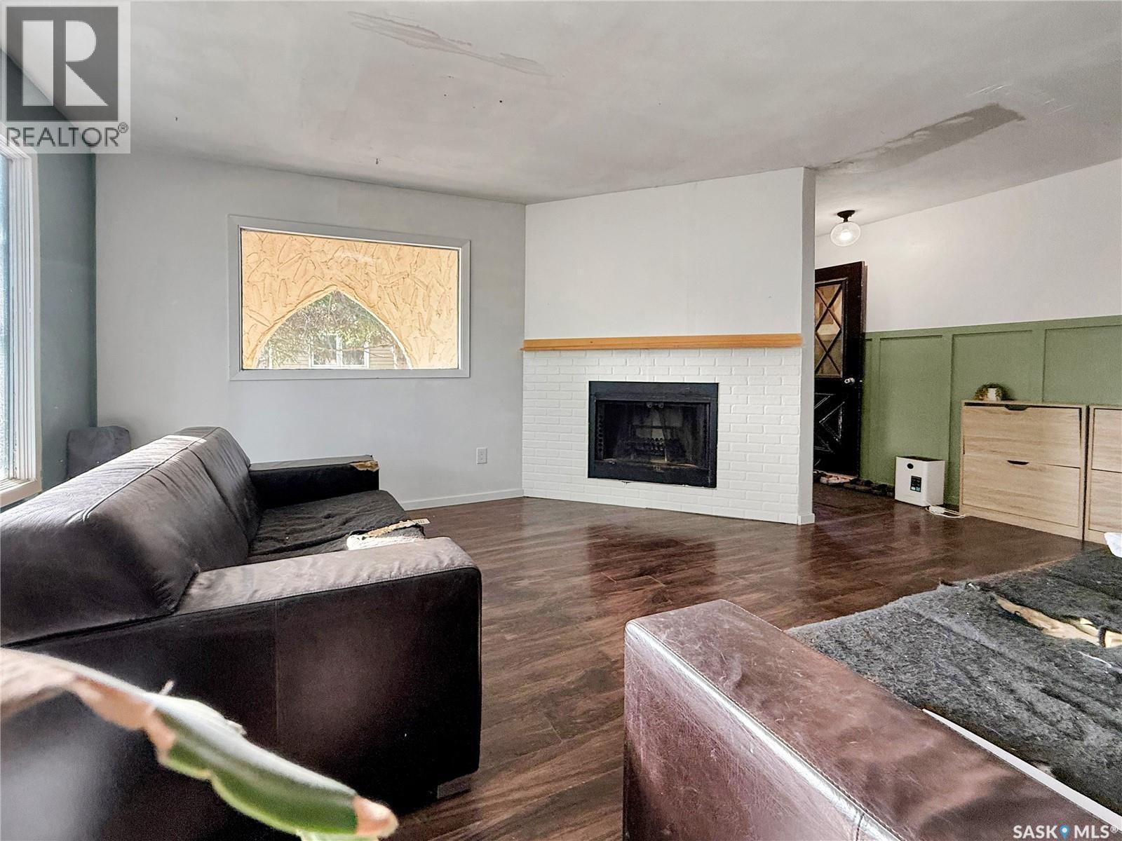 204 Allan Avenue, Saltcoats, SK - Indoor Photo Showing Living Room With Fireplace