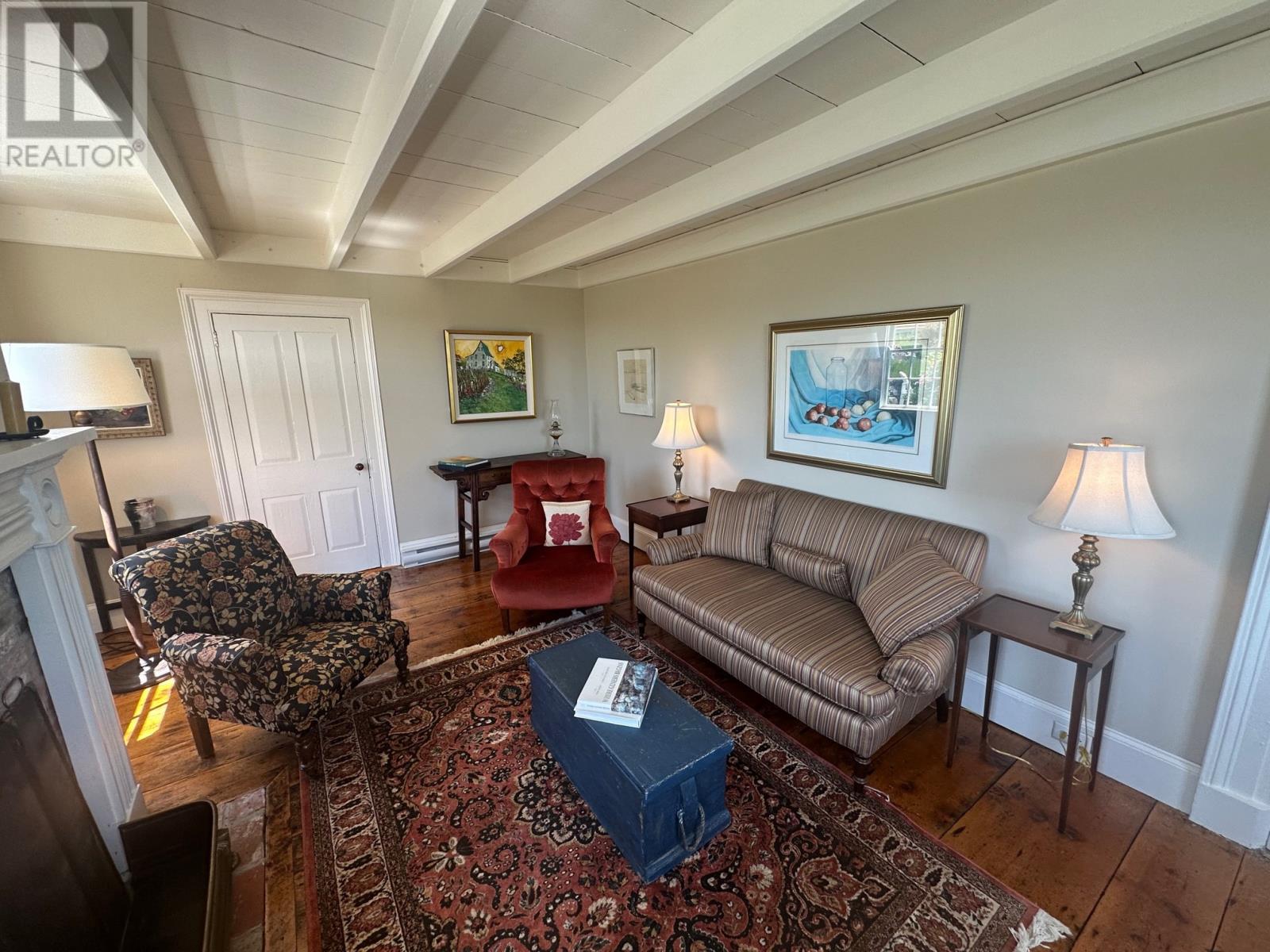 19 West Street, Trinity, NL - Indoor Photo Showing Living Room With Fireplace