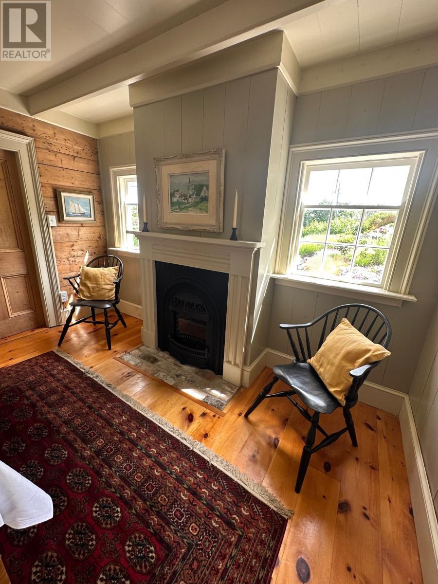 19 West Street, Trinity, NL - Indoor Photo Showing Living Room With Fireplace