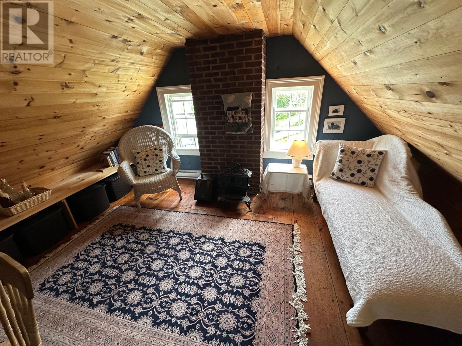 19 West Street, Trinity, NL - Indoor With Fireplace