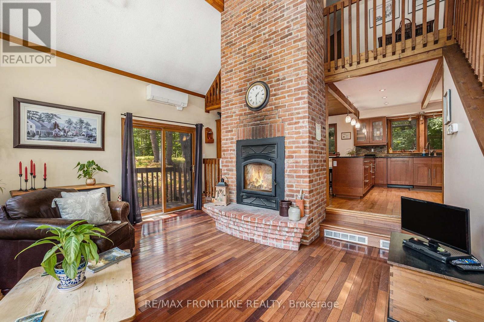 327 Lakewood Road, Tay Valley, ON - Indoor Photo Showing Living Room With Fireplace