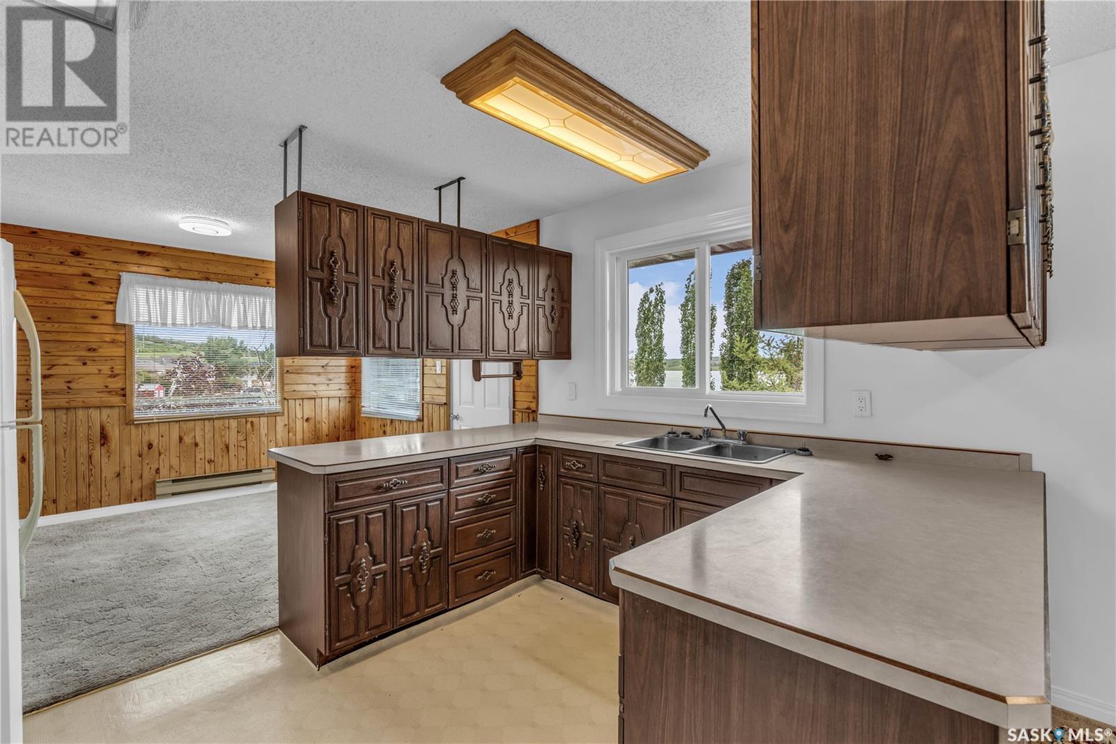 115 Boyer Drive, Meota Rm No.468, SK - Indoor Photo Showing Kitchen With Double Sink