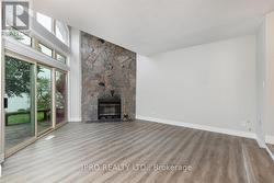 Family Room with wood burning fireplace -