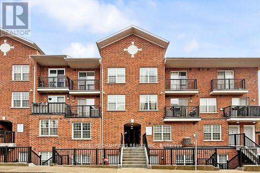 304 - 35 Strangford Lane S, Toronto, ON - Outdoor With Balcony