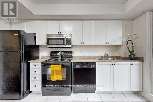 304 - 35 Strangford Lane S, Toronto, ON - Indoor Photo Showing Kitchen With Double Sink
