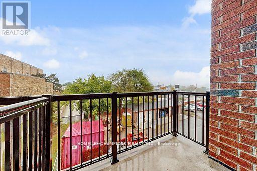 304 - 35 Strangford Lane S, Toronto, ON - Outdoor With Balcony With Exterior