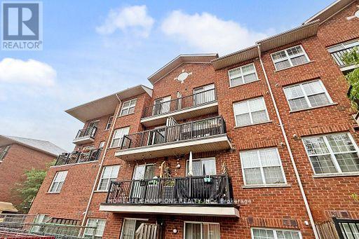 304 - 35 Strangford Lane S, Toronto, ON - Outdoor With Balcony