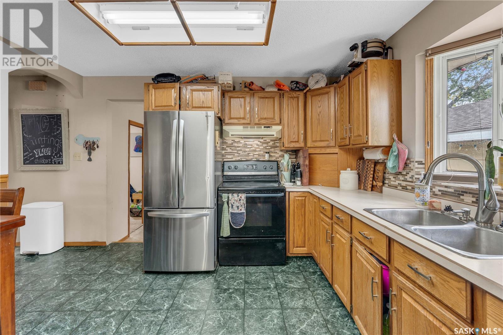 104 Railway Avenue, Dufferin Rm No. 190, SK - Indoor Photo Showing Kitchen With Double Sink