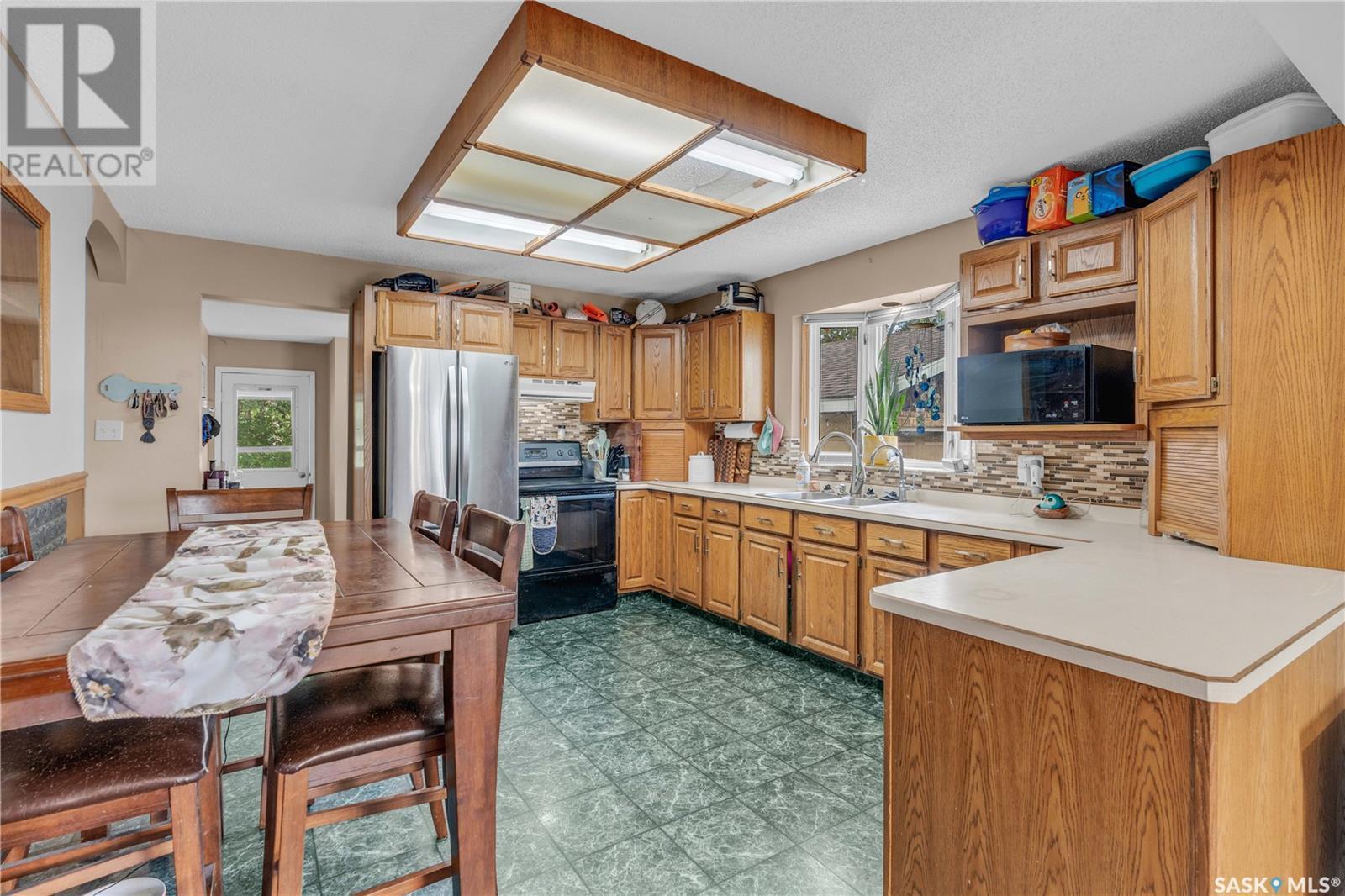 104 Railway Avenue, Dufferin Rm No. 190, SK - Indoor Photo Showing Kitchen With Double Sink