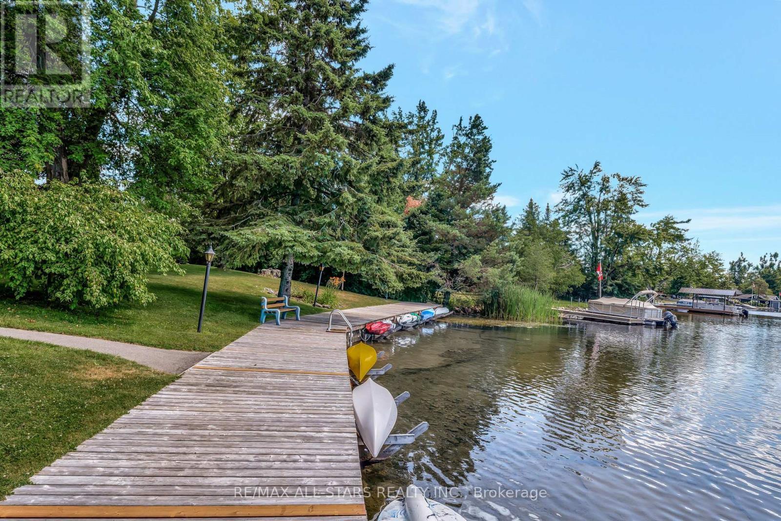 101 - 200 East Street S, Kawartha Lakes (Bobcaygeon), ON - Outdoor With Body Of Water